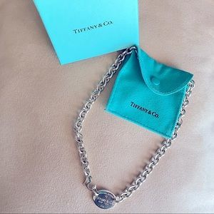 Tiffany and Co. 16 in Oval Tag Necklace. Pristine condition. Comes with Pouch